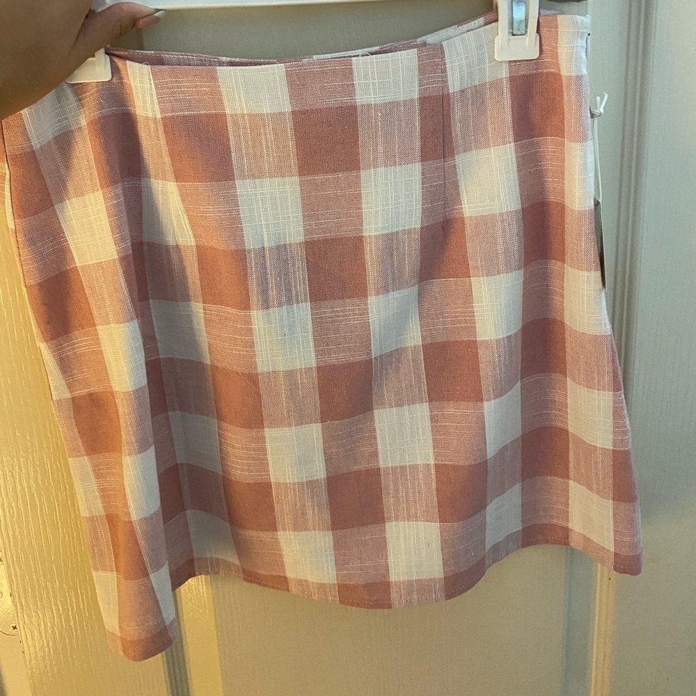 Fun pink checkered skirt.
